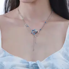 星柄デザインの猫ネックレス【氷のような青・トロピカルタッセル・胸元のアクセント】