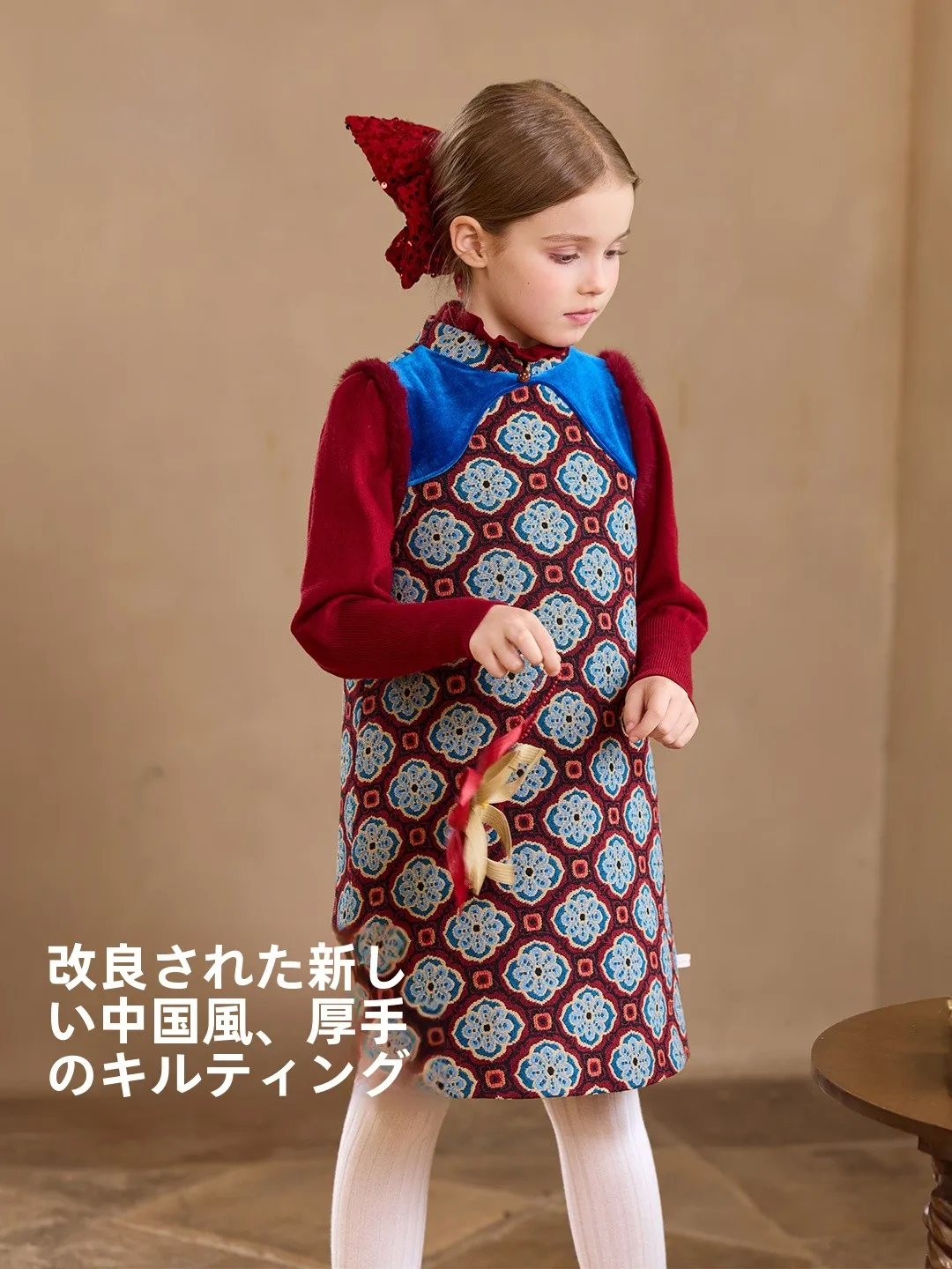 子供用中式デザインの保温背膊裙：13歳女児向けの秋冬日常着としての実用性とデザイン分析