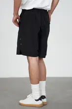 黒色のウエストゴム機能性ストレートパンツ【防水・光沢感・サイドスリット】