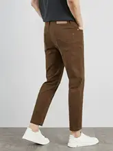 白色の九分丈パンツ【秋冬用・ストレッチ・スリムフィット・カジュアルデザイン】