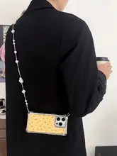 柔らかなイエローの花柄iPhone用ケース【ストラップ付き・斜め掛け対応・レザー製・四隅開孔】