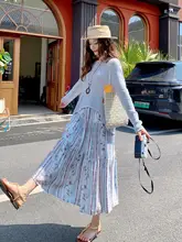 個性的なリゾートスタイルの夏用ファッション【不規則なデザインのニットトップ・プリントスカート】（セットアップ対応）