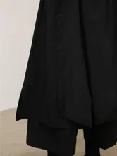 不規則な多層デザインの九分丈ワイドパンツスカート