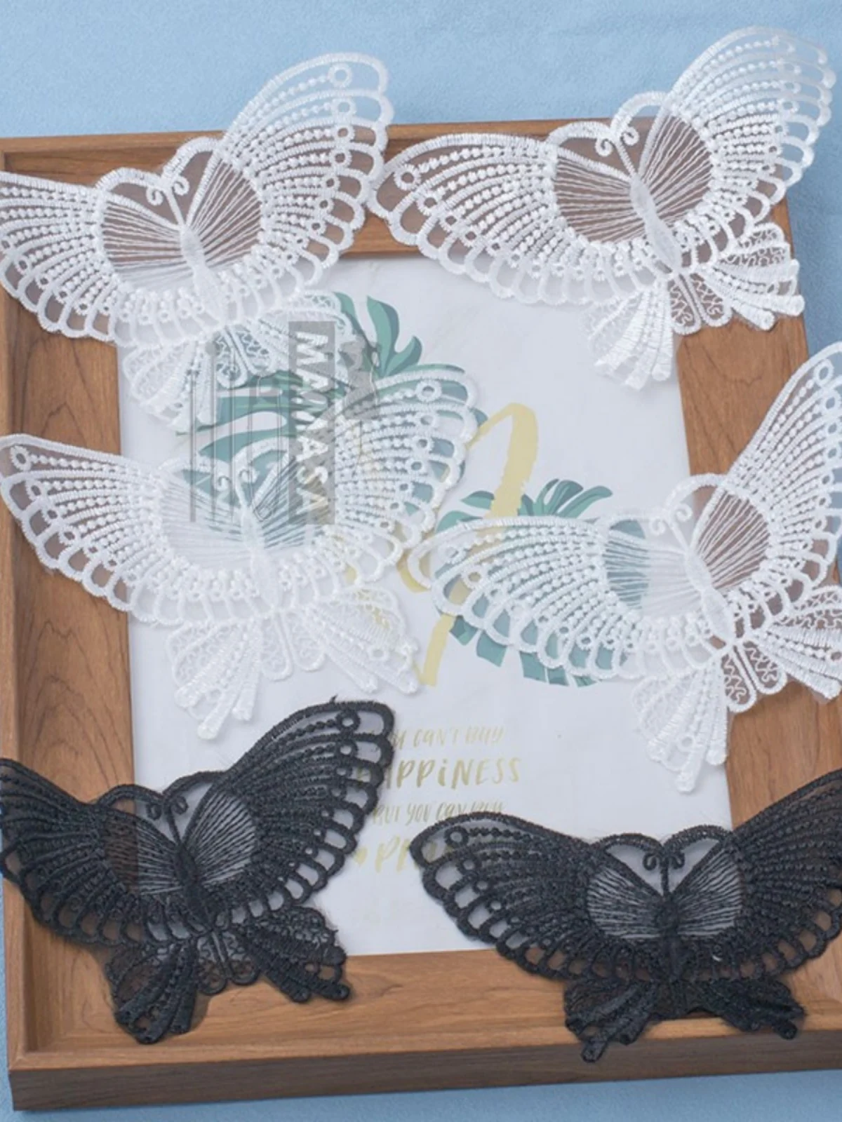黒白の牛乳シルク刺繍チュール蝶フラワー：DIY手作りレース布の実用性と適用シーン
