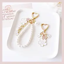 桜の花モチーフのキーホルダー【桃の花・パールチャーム・バッグ用】