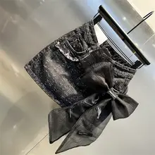 立体的な大きなリボンデザインのデニムミニスカート【メッシュ生地・フィットスタイル】（セットアップ対応）