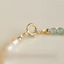 天然ヒスイとパールの華奢なブレスレット【デザイン性のある手首周り・クリスタルビーズ使用】（セットアップ対応）