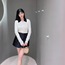 灰色ブロックカラーの翻領ニットセーター