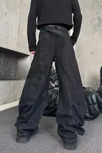 個性派デザインのワイドレッグカジュアルデニムパンツ【プレスト加工・フレア・ロング丈】