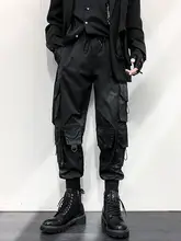 黒色の多機能カーゴパンツ【束脚デザイン・ゆったりシルエット・タクティカルポケット】