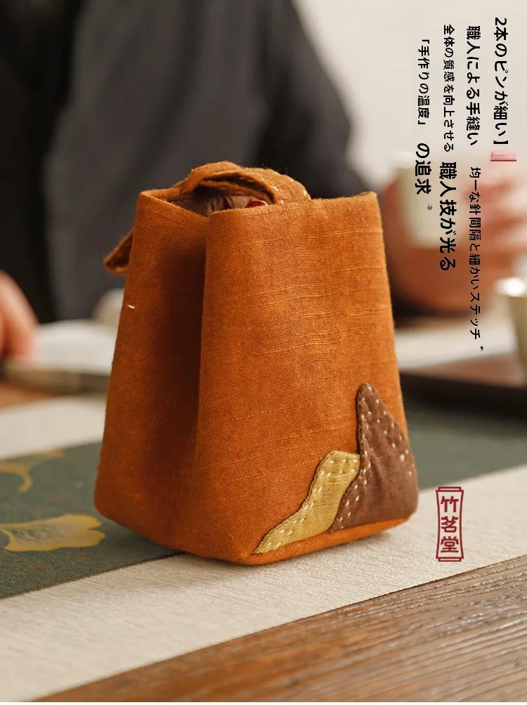 麻混合素材の手提げカップバッグ：旅行小物としての収納効率と耐久性の実証