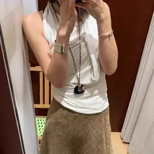 シンプルなデザイン！黒の瑪瑙製の円環ペンダントネックレス【編み込み式・ロングタイプ・ニット用】