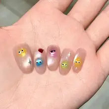 可愛らしいカートゥーンデザインの猫眼ネイルチップ【短め・手作り・レインボーシュガーカラー】