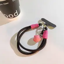 可愛いカートゥーンデザインの星型モバイルケース用チャーム【極上の柔らかさ・黒い手首ベルト・短編み込み・多機能キーリング・カメラアクセサリー・女性向け】
