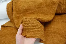 デザイン性のあるストレッチ カーキ色のストライプニットウール生地【カーディガン用】