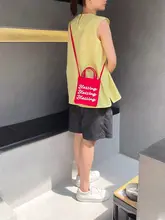 赤いトマトデザインのミニ斜め掛け帆布バッグ