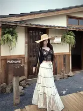 リゾートスタイルの着こなしに最適！日焼け防止の長袖カーディガンとレースタンクトップ、ハイウエストスカートの三点コーディネート（セットアップ対応）