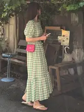 泡泡袖のフラワーチェックワンピース【リボン付き・ウエスト絞り・ゆったりシルエット】