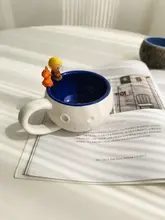 北欧風浮彫りデザインの手作り陶器マグカップ【星球モチーフ・個性的】