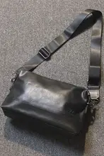 トレンドの新しいメンズハンドバッグ大容量ソフトレザーカジュアル