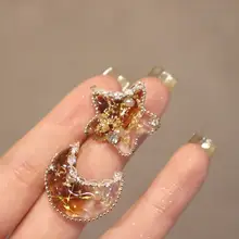 星と月のデザインの高級感あるジルコニア不対称ブラウンイヤリング【イヤーカフ付き】
