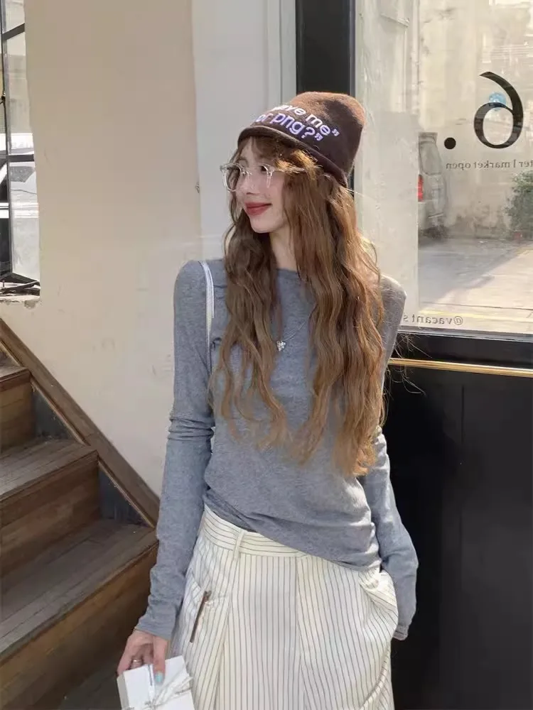シースルー服を着るなら、どう選ぶべきか？——通勤の疲れを癒す「香港風セクシーマイクロシースルー長袖ボトムシャツ」の本物の使い勝手