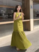流行の流れを感じる！緑のノースリーブワンピース【トレンド・夏用・リゾートスタイル】