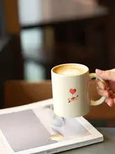 バルーン猫デザインの陶器製マグカップ【ハンドル付き・かわいらしいコーヒーカップ】