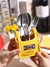 笑顔デザインの陶器製箸立て【持ち手付き・カトラリー収納用】