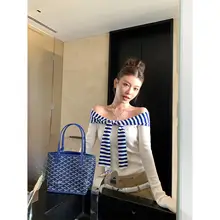 デザイン感あふれる撞色ストライプリボンデザインニットトップス