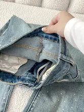 高腰のデザインが魅力！薄色ダメージデニムのフレアパンツ【夏用・煌めくストーン付き】