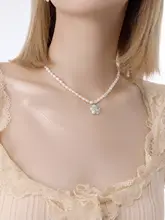 薄荷グリーンの天然淡水パールネックレス【軽やかなデザイン・女性用・ロックボーンチェーン】