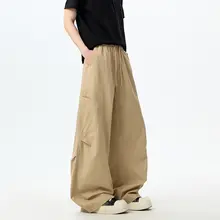 多ポケットストレートカットカーキ色工事用パンツ【ユニセックス・レトロスタイル・ワイドパンツ】（セットアップ対応）
