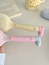 軽量でかわいい！頭皮マッサージ機能付きヘアブラシ【ポンポンスタイル・携帯便利】