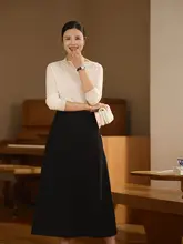 不規則なネックデザインのニットセーター【ドイツ羊毛】