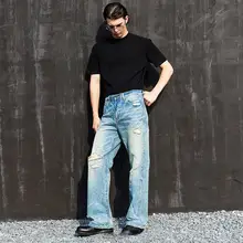鹿脂クリームブルーのスプレーウォッシュダブルビーニットストレートデニムパンツ
