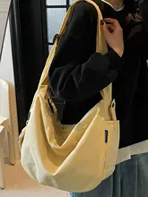 カジュアルなキャンバスショルダーバッグ【男女兼用・大容量・通勤・学生向け】