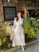 ブルーのニットカーディガン【キャミソール付き・独特なデザイン・女性用】（セットアップ対応）