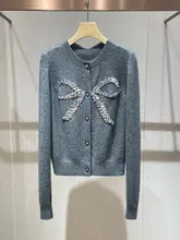 春の新作！キラキラ蝶結びニットトップスとプリーツスカート【学院風・チュニックスタイル】（セットアップ対応）