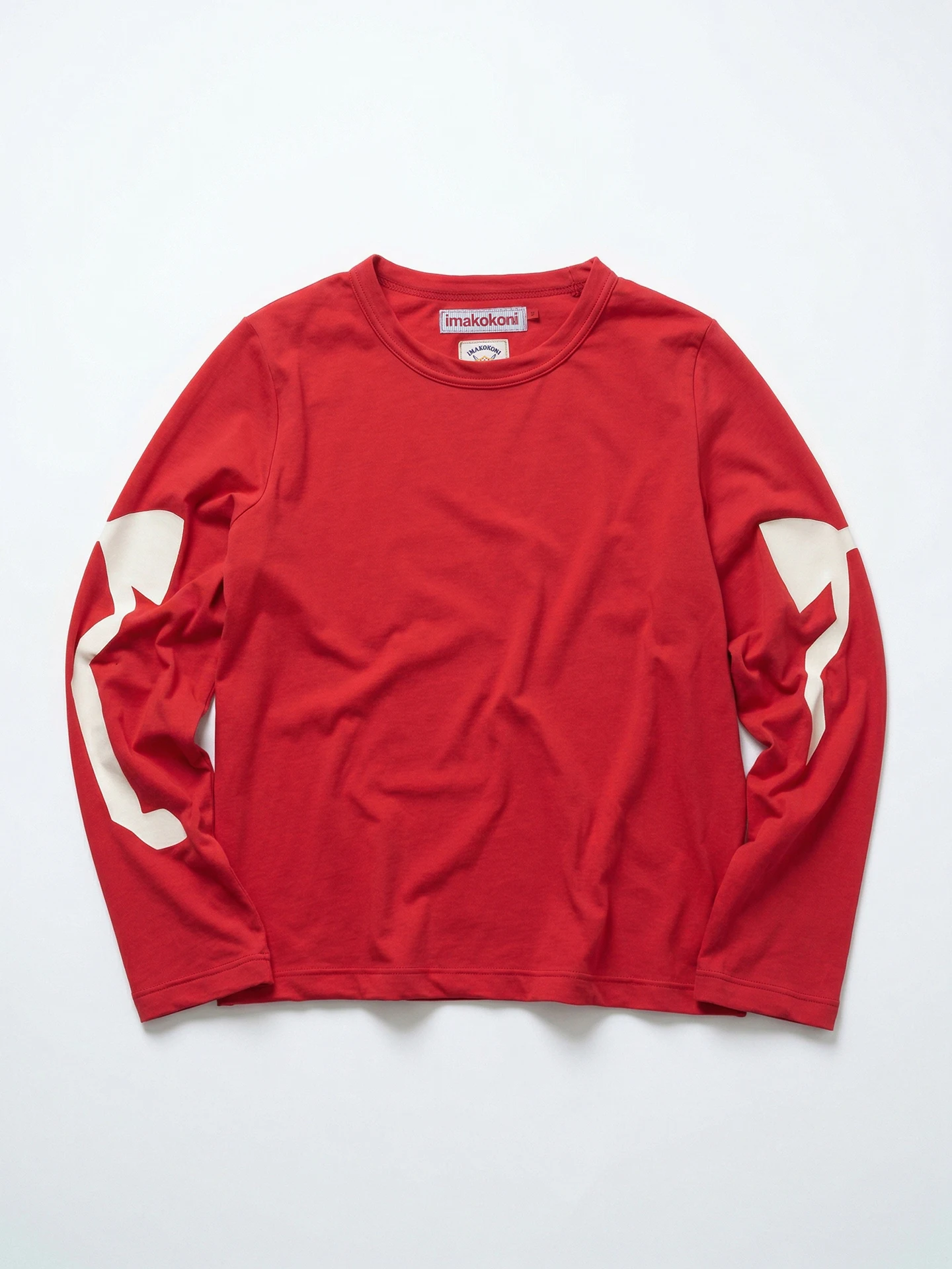 レディース 春用 レッドロングスリーブTシャツ【リボンプリント・コットン・ゆったりシルエット】