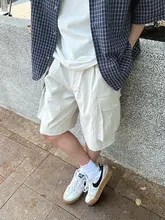 米白色のカジュアルワークショーツ【ゆったりシンプル・大口ポケット・夏用】（セットアップ対応）