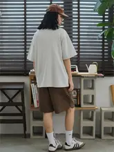 ヴィンテージ風 バックプリントデザインのゆったりショートスリーブTシャツ