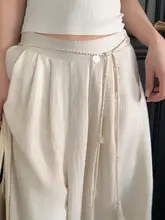 ボヘミアンスタイルの流れるフリンジ付きウエストストラップ