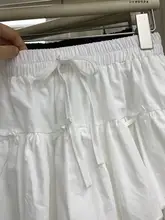 バレエ風デザインの白いケーキスカート【リボン付き・フレア・女性用】