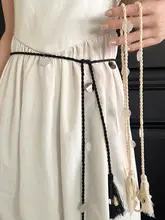 ボヘミアンスタイルの流れるフリンジ付きウエストストラップ