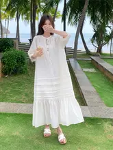 女性の夏用オフホワイトのルーズレースアップドレス