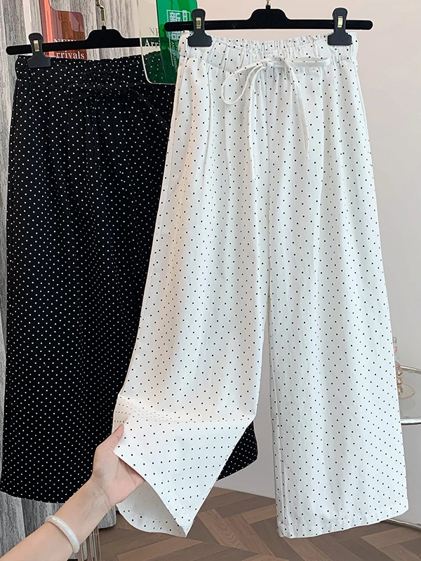 レトロデザインのブラックドットプリントストレートパンツ：夏の通勤スタイルに最適なゆったりフィットパンツ