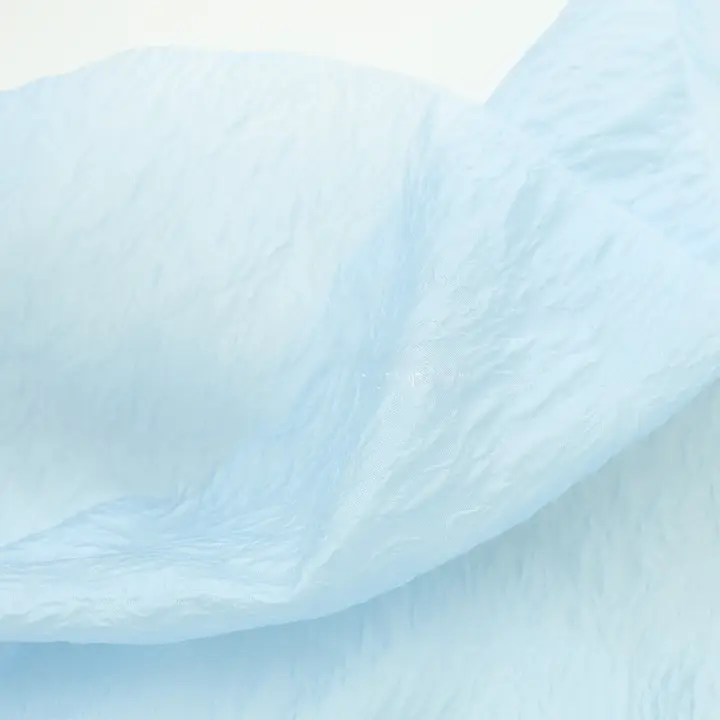 薄手の浮き彫りパール感のある天ブルーの薔薇模様オーガンジー生地【ドレス用・チュチュスカート生地】