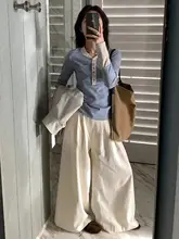 デザイン性のあるボタン付きヘンリーネック長袖Tシャツ【レトロカラーブロック・ストライプ・女性用】