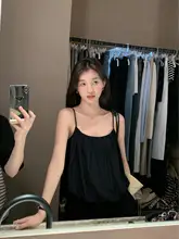 デザイン性のあるノースリーブフラワートップスとワイドパンツ（セットアップ対応）
